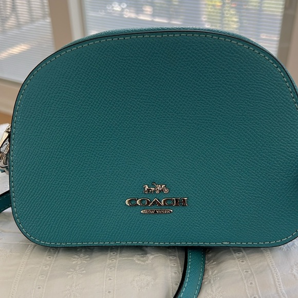 Turquoise blue Coach crossbody bag. - Picture 7 of 9